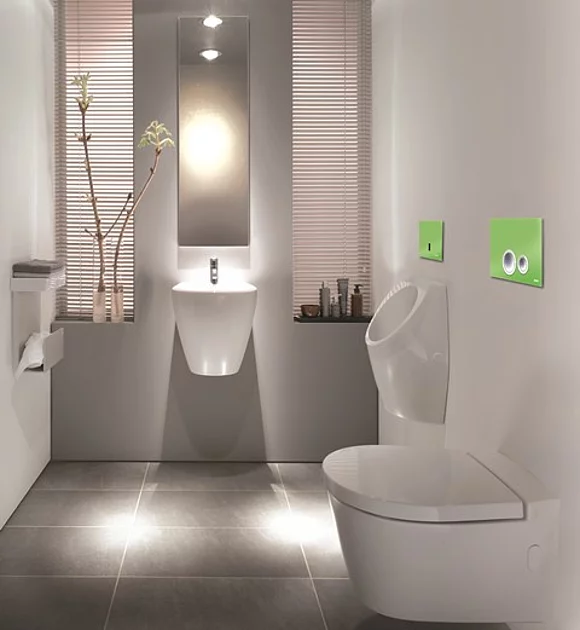 Moderne WC-Betätigungsplatten wie die von JOMO setzen gezielt Farbakzente und binden die Funktionselemente gekonnt in die Badgestaltung mit ein. (Foto: WERIT Sanitär-Kunststofftechnik GmbH & Co. KG)